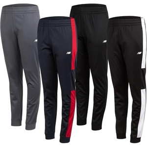 image:imageNew Balance Boys Sweatpants  4 Pack Active Tricot Boys Joggers Athletic Pants Kids Activewear Pants with Pockets 420BlackEclipse