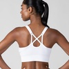image:imageNew Balance Womens Seamless Strappy Sports Bra 3 Pack  Wirefree Athletic Bralette for Yoga Training and Comfort WearWhiteBlackPink